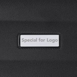 A black drink bottle featuring a textured surface and a rectangular area for branding or a logo.