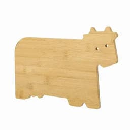 A bamboo cutting board shaped like a cow, featuring a natural wood finish and rounded edges.