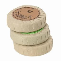 Three bars of soap wrapped in brown paper with a green label, stacked on top of each other.
