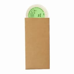 A brown paper packaging with a green circular product inside. The package features a logo on the front.
