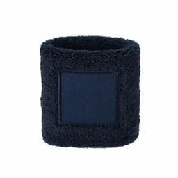 A dark blue wristband made of plush, fuzzy material, featuring a blank square patch.
