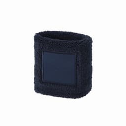 A navy blue drink bottle holder with a fluffy texture and a square patch for a logo or branding.