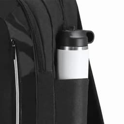 A black backpack with a drink bottle in a side pocket. The bottle is white with a black lid.