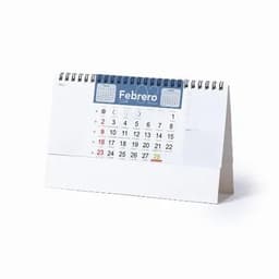 A desk calendar featuring a white base with a blue top section, displaying dates for February. It has a spiral binding and a logo.