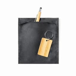 A black pouch featuring a pen, a wooden keychain, and a bamboo tag. It has a textured finish.