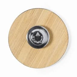 A round bamboo magnet with a shiny metallic centre, showcasing a minimalist design.