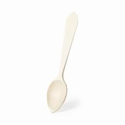 A spoon made of light-coloured material, featuring a smooth handle and a rounded bowl.
