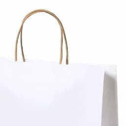 A white paper bag with a brown handle, featuring a simple and minimalist design.