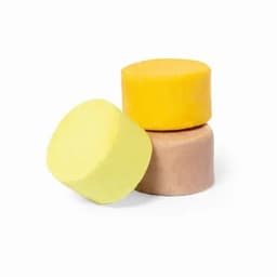 Three round solid bars in yellow, light yellow, and brown colours stacked together. The product has a smooth finish.