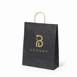 A black paper shopping bag with a gold logo and a decorative handle.
