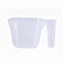 A transparent plastic measuring cup with a spout and handle, featuring measurement markings along the side.