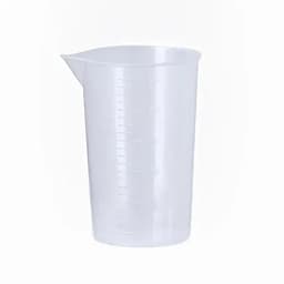 A measuring cup in clear plastic with graduated markings for precise volume measurements.