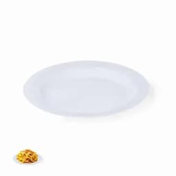 A white, oval-shaped serving platter with no contents, placed above a small dish of nachos.