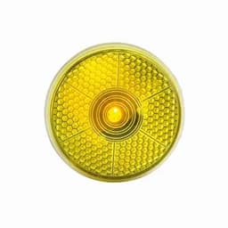 A reflective yellow light with a honeycomb pattern and a central bulb, featuring an integrated logo.