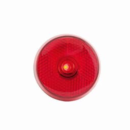 A round red light with a honeycomb pattern, featuring a central bulb. It has a clear outer casing.