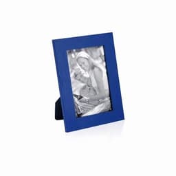 A blue photo frame displaying a black and white image of a couple. The frame has a stand at the back.