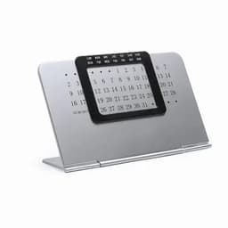 A silver perpetual calendar with a black frame displaying days and dates for the month. It has a modern design.