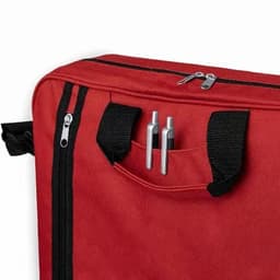 A red bag with black accents, featuring two pens in an exterior pocket and zippers for closure.