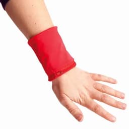 A red wrist pouch with a zipper is worn on a hand, designed to fit snugly around the wrist.