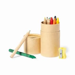 A set of coloured pencils in a cylindrical holder, alongside a sharpener and a green crayon. The holder is light brown.