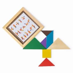 A tangram set featuring various geometric shapes in red, blue, green, yellow, and brown, alongside a framed picture of designs.