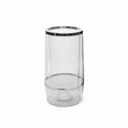 A transparent glass with a silver rim, featuring a sleek, modern design and a cylindrical shape.