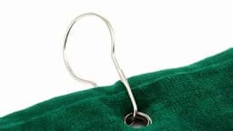 A green golf towel featuring a metal clip for easy attachment. It includes a branding logo.