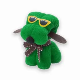 A green plush dog toy wearing yellow sunglasses and a brown bow tie, sitting upright.