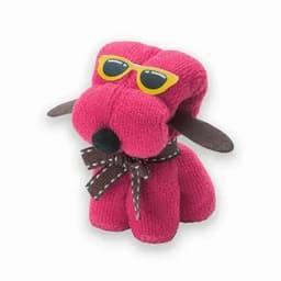 A pink dog toy with sunglasses, featuring brown ears and a brown bow around its neck.