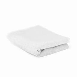 A folded white towel is displayed, showcasing its soft texture and simple design. It features no visible branding.
