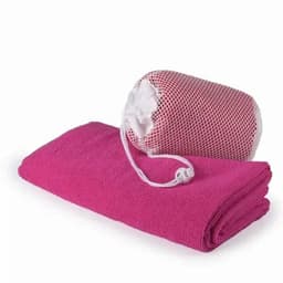 A pink gym towel neatly folded beside a pink mesh storage bag with a drawstring closure.