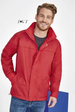 A red men's jacket with a hood, featuring a water-repellent exterior and a jersey lining, and includes a logo.