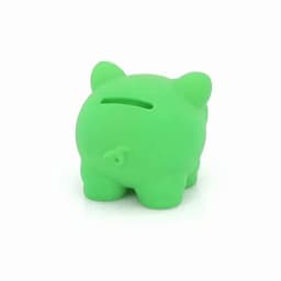 A green piggy bank with a slot for coins and a rounded, cartoonish design.