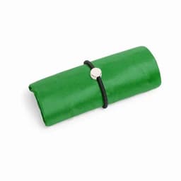 A green roll-up organiser secured with a black band and a silver button detail.