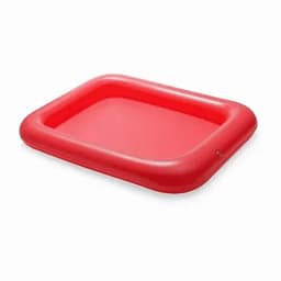 A red inflatable pool with a rectangular shape and raised edges. The interior is smooth and flat.