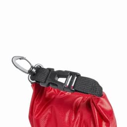 A red pouch with a black strap and clip, featuring a textured surface. The pouch is partially crumpled.