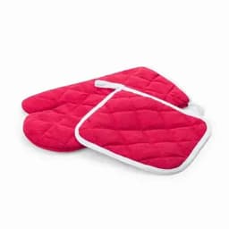 A set of red kitchen oven mitts and pot holders with a textured quilted design, featuring white trim.