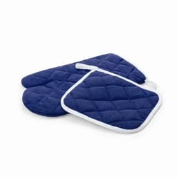 A set of navy blue oven mitts and a pot holder with a quilted pattern and white trim.