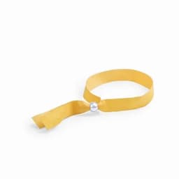 A yellow wristband made of fabric, featuring a silver bead fastening.