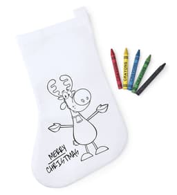 A Christmas stocking featuring a cartoon reindeer design, accompanied by four crayons in various colours.