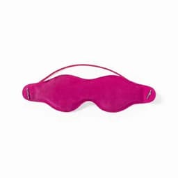 A sleep mask in vibrant pink with a comfortable design and adjustable straps. It features a logo.