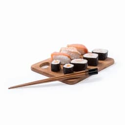 A wooden platter holding various types of sushi, accompanied by chopsticks.
