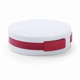 A round, white storage container features a red strap around its middle and has a branding logo.