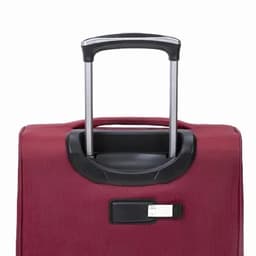 A maroon suitcase with a retractable handle and a luggage tag holder, featuring a sleek design and branding.