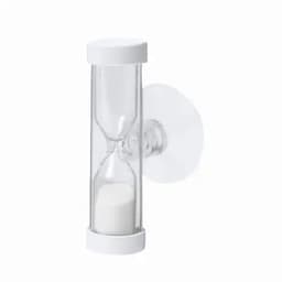 An hourglass with transparent glass and white ends, featuring a small amount of sand inside.