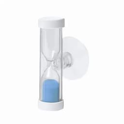 A clear hourglass timer with white ends and blue sand, mounted on a suction cup.