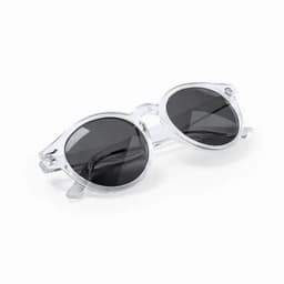 A pair of transparent sunglasses with dark lenses, featuring a round shape and stylish design.