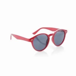 A pair of round sunglasses with a red frame and dark lenses. The glasses feature branding on the side.