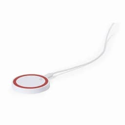A round white wireless charger with a red accent and a connecting white cable.