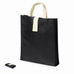 A black tote bag with cream handles and a smaller black pouch. The tote has a simple design and features a logo.